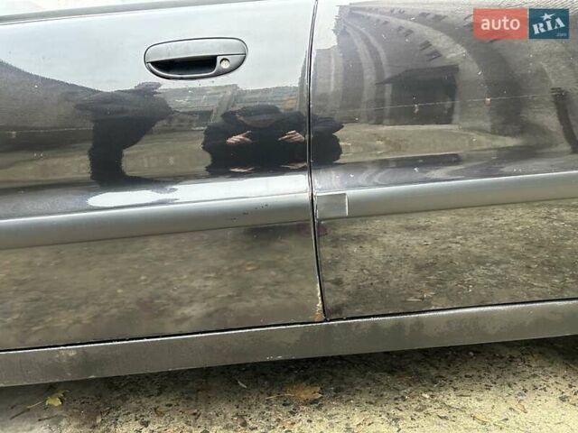 Чорний Деу Ланос, об'ємом двигуна 1.5 л та пробігом 222 тис. км за 1800 $, фото 14 на Automoto.ua