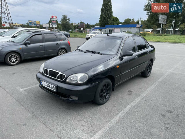 Черный Дэу Ланос, объемом двигателя 1.5 л и пробегом 350 тыс. км за 2150 $, фото 1 на Automoto.ua