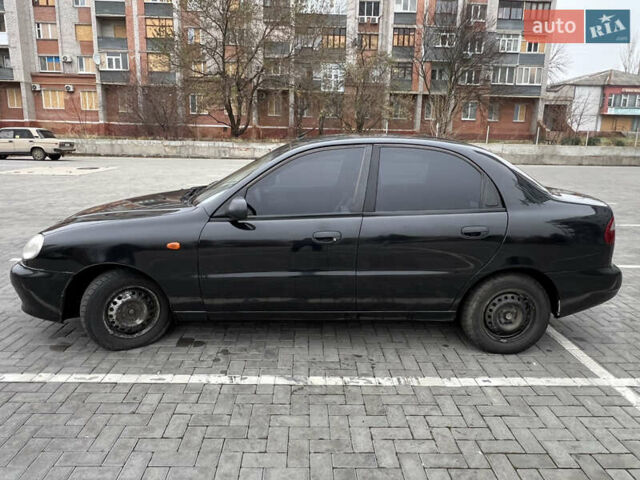 Черный Дэу Ланос, объемом двигателя 1.5 л и пробегом 286 тыс. км за 2400 $, фото 2 на Automoto.ua