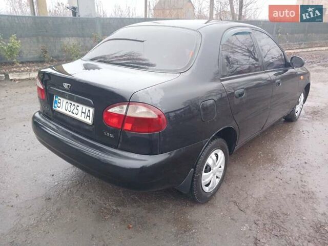 Черный Дэу Ланос, объемом двигателя 1.35 л и пробегом 122 тыс. км за 1699 $, фото 3 на Automoto.ua