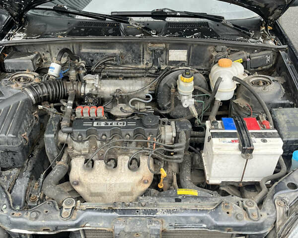 Чорний Деу Ланос, об'ємом двигуна 1.5 л та пробігом 213 тис. км за 1700 $, фото 8 на Automoto.ua