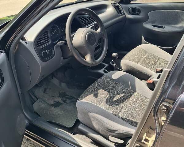 Черный Дэу Ланос, объемом двигателя 1.5 л и пробегом 160 тыс. км за 2500 $, фото 17 на Automoto.ua