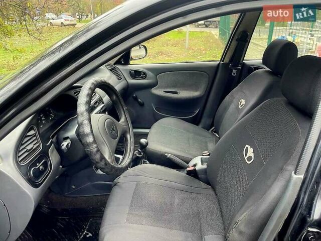 Черный Дэу Ланос, объемом двигателя 1.5 л и пробегом 160 тыс. км за 1800 $, фото 5 на Automoto.ua