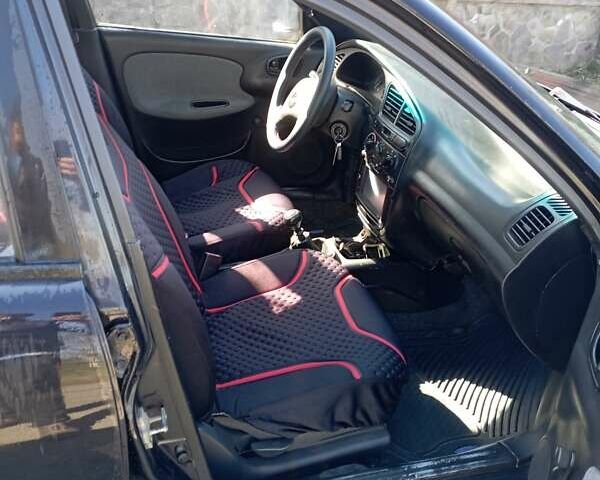 Черный Дэу Ланос, объемом двигателя 1.5 л и пробегом 250 тыс. км за 1750 $, фото 3 на Automoto.ua