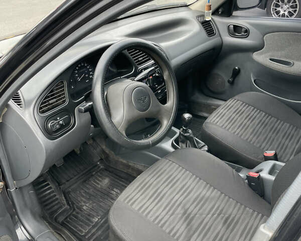 Черный Дэу Ланос, объемом двигателя 1.5 л и пробегом 350 тыс. км за 2150 $, фото 6 на Automoto.ua