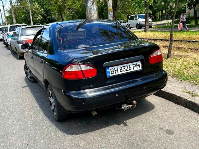 Черный Дэу Ланос, объемом двигателя 1.5 л и пробегом 123 тыс. км за 2200 $, фото 2 на Automoto.ua