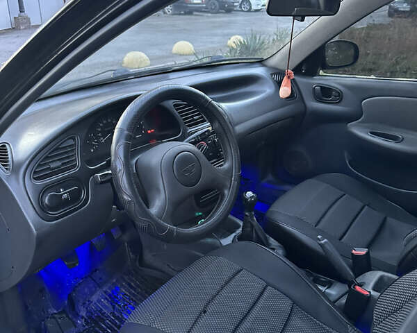 Черный Дэу Ланос, объемом двигателя 1.5 л и пробегом 270 тыс. км за 1900 $, фото 15 на Automoto.ua