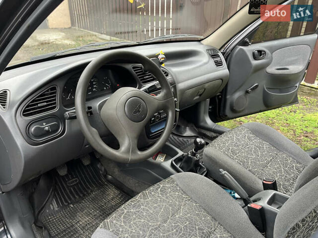 Черный Дэу Ланос, объемом двигателя 1.5 л и пробегом 140 тыс. км за 2500 $, фото 18 на Automoto.ua