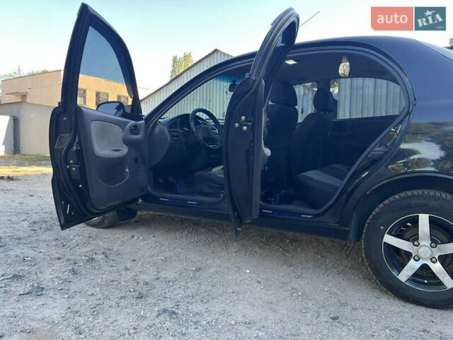 Чорний Деу Ланос, об'ємом двигуна 1.5 л та пробігом 134 тис. км за 4000 $, фото 6 на Automoto.ua