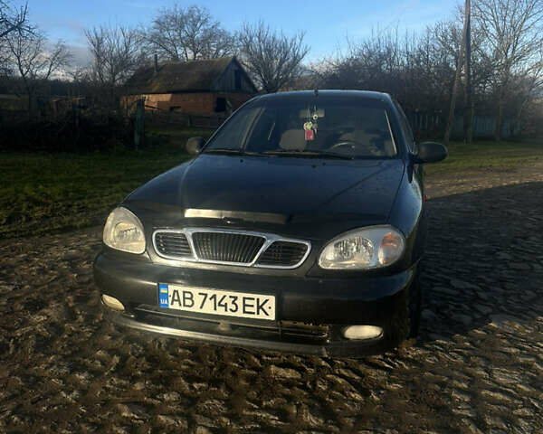 Черный Дэу Ланос, объемом двигателя 1.5 л и пробегом 234 тыс. км за 2300 $, фото 1 на Automoto.ua