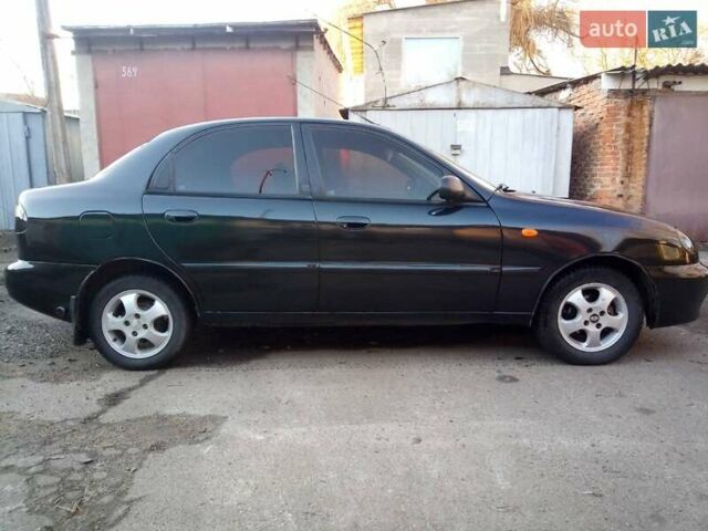 Черный Дэу Ланос, объемом двигателя 1.5 л и пробегом 231 тыс. км за 1999 $, фото 3 на Automoto.ua