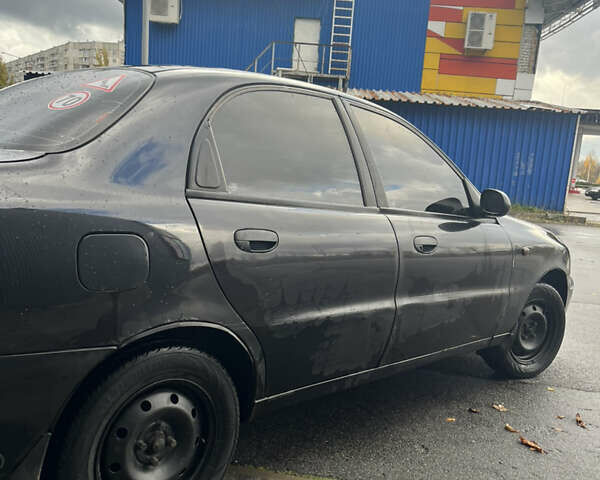 Чорний Деу Ланос, об'ємом двигуна 1.5 л та пробігом 213 тис. км за 1700 $, фото 5 на Automoto.ua