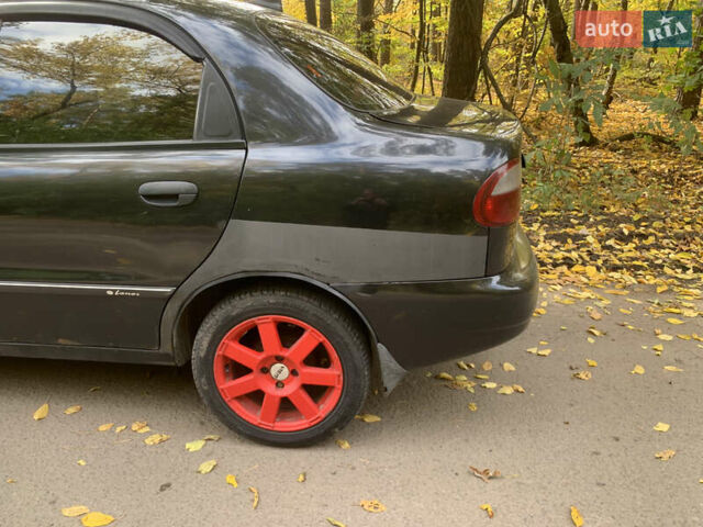 Черный Дэу Ланос, объемом двигателя 1.5 л и пробегом 290 тыс. км за 1600 $, фото 3 на Automoto.ua