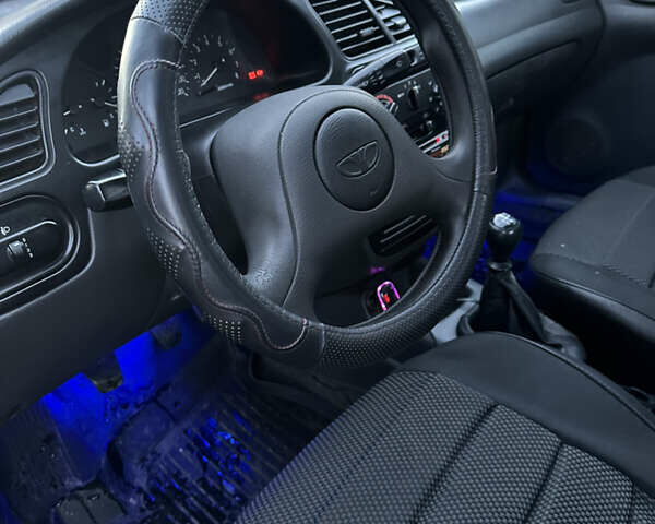 Черный Дэу Ланос, объемом двигателя 1.5 л и пробегом 270 тыс. км за 1900 $, фото 10 на Automoto.ua