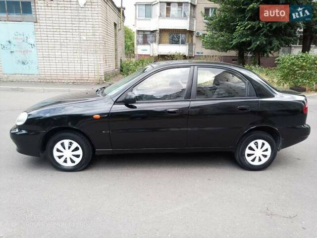 Черный Дэу Ланос, объемом двигателя 1.5 л и пробегом 200 тыс. км за 1999 $, фото 5 на Automoto.ua