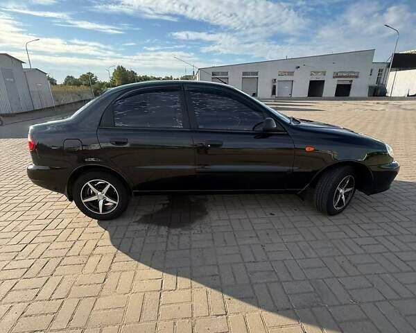 Черный Дэу Ланос, объемом двигателя 1.5 л и пробегом 163 тыс. км за 2900 $, фото 19 на Automoto.ua