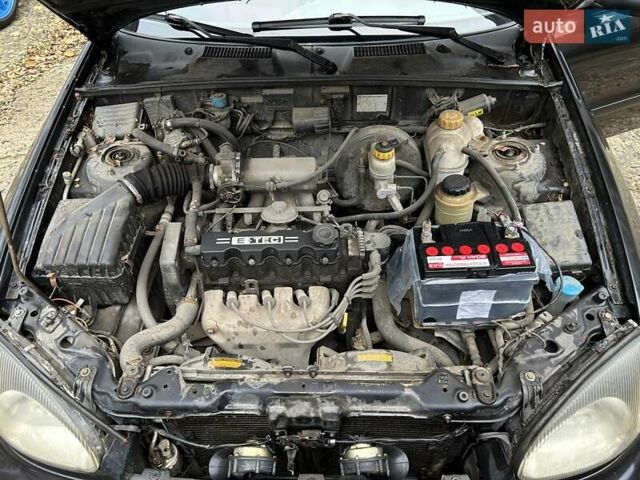 Чорний Деу Ланос, об'ємом двигуна 1.5 л та пробігом 222 тис. км за 1800 $, фото 21 на Automoto.ua