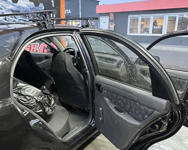 Черный Дэу Ланос, объемом двигателя 1.5 л и пробегом 145 тыс. км за 1799 $, фото 10 на Automoto.ua