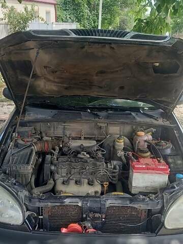 Черный Дэу Ланос, объемом двигателя 1.5 л и пробегом 328 тыс. км за 2700 $, фото 12 на Automoto.ua