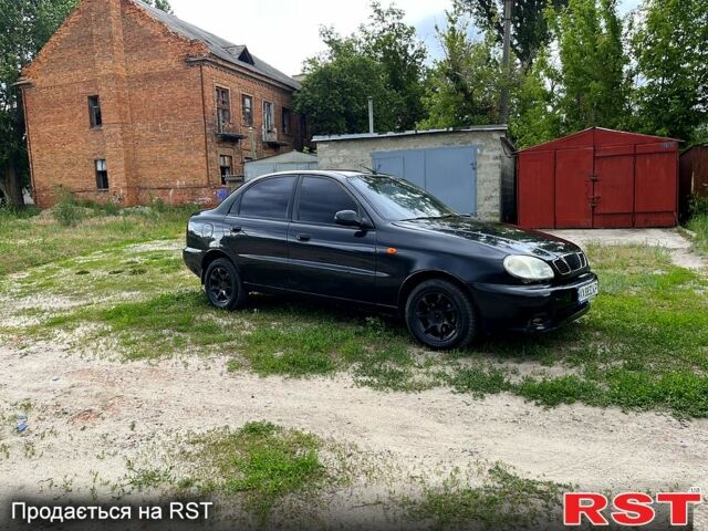 Черный Дэу Ланос, объемом двигателя 1.5 л и пробегом 250 тыс. км за 1400 $, фото 2 на Automoto.ua