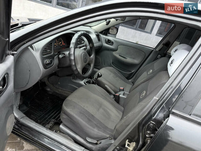 Черный Дэу Ланос, объемом двигателя 1.5 л и пробегом 251 тыс. км за 2550 $, фото 10 на Automoto.ua