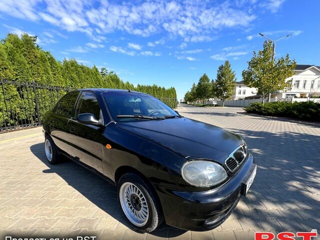 Черный Дэу Ланос, объемом двигателя 1.5 л и пробегом 183 тыс. км за 2600 $, фото 1 на Automoto.ua