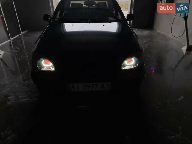 Черный Дэу Ланос, объемом двигателя 1.5 л и пробегом 208 тыс. км за 3000 $, фото 1 на Automoto.ua