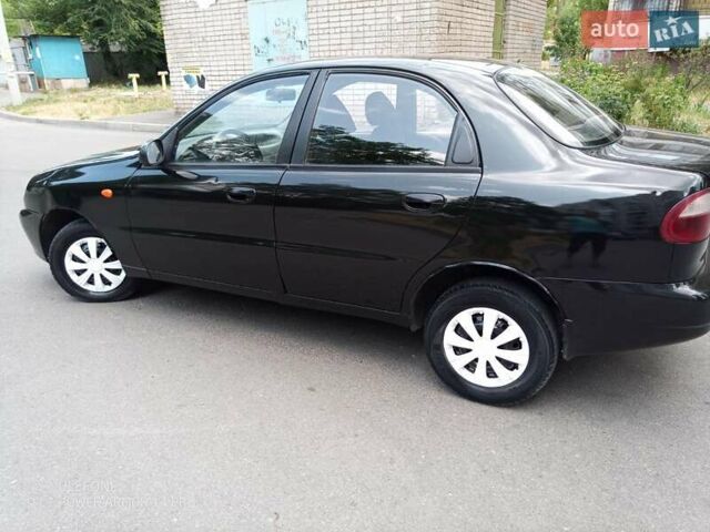 Черный Дэу Ланос, объемом двигателя 1.5 л и пробегом 200 тыс. км за 1999 $, фото 7 на Automoto.ua