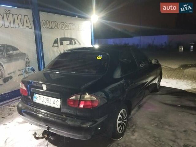 Черный Дэу Ланос, объемом двигателя 1.5 л и пробегом 350 тыс. км за 1850 $, фото 2 на Automoto.ua