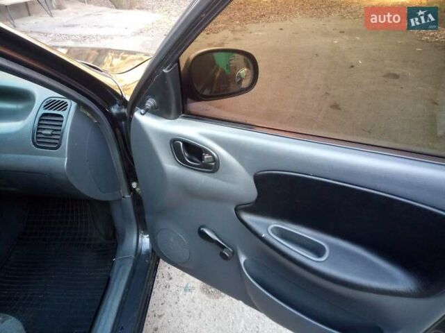 Черный Дэу Ланос, объемом двигателя 1.5 л и пробегом 231 тыс. км за 1999 $, фото 10 на Automoto.ua