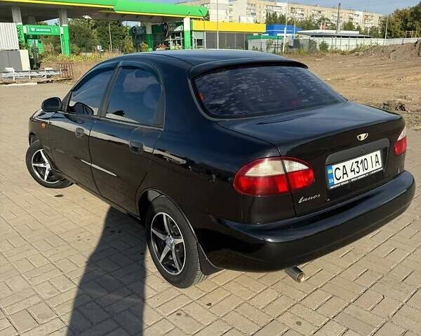 Черный Дэу Ланос, объемом двигателя 1.5 л и пробегом 163 тыс. км за 2900 $, фото 31 на Automoto.ua
