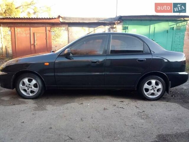 Черный Дэу Ланос, объемом двигателя 1.5 л и пробегом 231 тыс. км за 1999 $, фото 5 на Automoto.ua