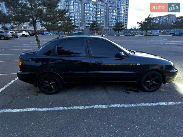 Черный Дэу Ланос, объемом двигателя 1.5 л и пробегом 220 тыс. км за 3100 $, фото 31 на Automoto.ua