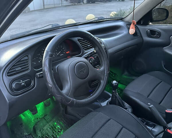 Черный Дэу Ланос, объемом двигателя 1.5 л и пробегом 270 тыс. км за 1900 $, фото 14 на Automoto.ua