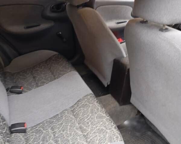 Черный Дэу Ланос, объемом двигателя 1.5 л и пробегом 272 тыс. км за 2000 $, фото 5 на Automoto.ua