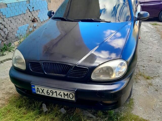 Черный Дэу Ланос, объемом двигателя 1.5 л и пробегом 370 тыс. км за 2300 $, фото 1 на Automoto.ua