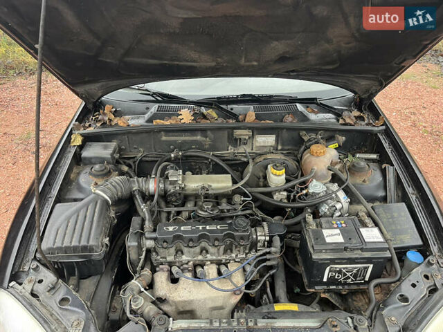 Черный Дэу Ланос, объемом двигателя 1.5 л и пробегом 298 тыс. км за 1000 $, фото 9 на Automoto.ua