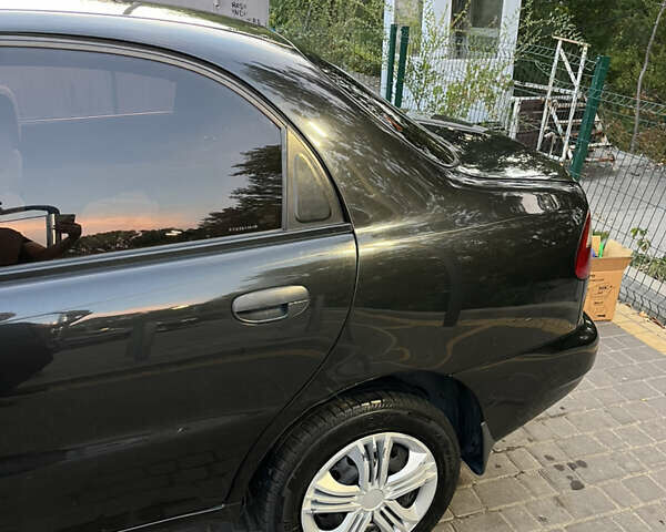 Чорний Деу Ланос, об'ємом двигуна 1.5 л та пробігом 157 тис. км за 3300 $, фото 7 на Automoto.ua