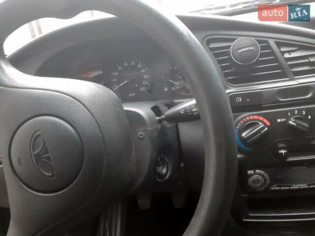 Черный Дэу Ланос, объемом двигателя 1.5 л и пробегом 94 тыс. км за 2800 $, фото 5 на Automoto.ua