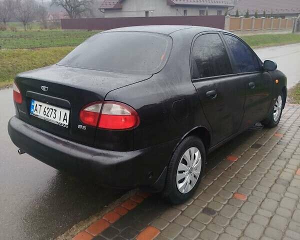 Черный Дэу Ланос, объемом двигателя 1.5 л и пробегом 200 тыс. км за 2150 $, фото 3 на Automoto.ua
