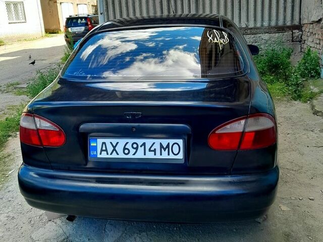 Черный Дэу Ланос, объемом двигателя 1.5 л и пробегом 370 тыс. км за 2300 $, фото 2 на Automoto.ua