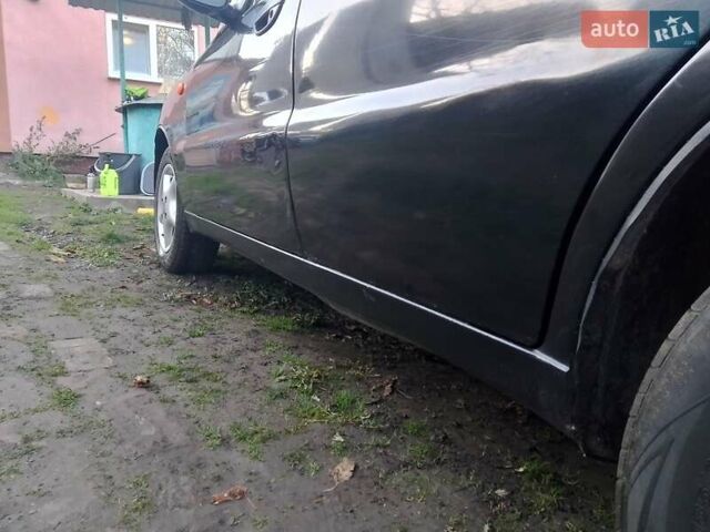 Черный Дэу Ланос, объемом двигателя 1.5 л и пробегом 256 тыс. км за 1850 $, фото 4 на Automoto.ua