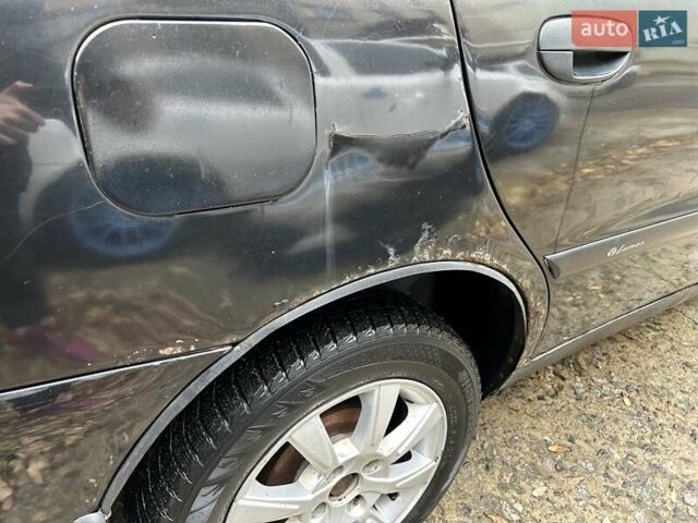 Чорний Деу Ланос, об'ємом двигуна 1.5 л та пробігом 222 тис. км за 1800 $, фото 6 на Automoto.ua