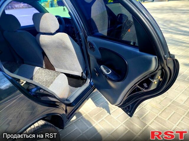 Черный Дэу Ланос, объемом двигателя 1.5 л и пробегом 163 тыс. км за 3150 $, фото 9 на Automoto.ua