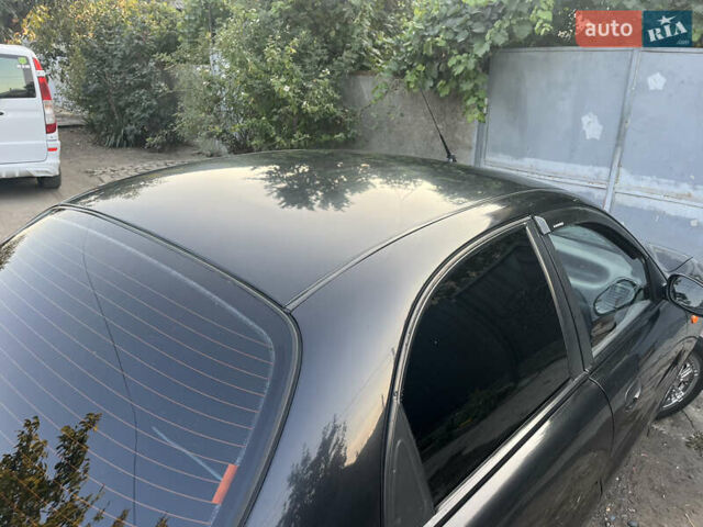 Черный Дэу Ланос, объемом двигателя 1.5 л и пробегом 160 тыс. км за 2800 $, фото 6 на Automoto.ua