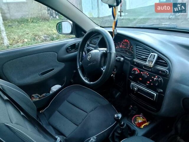 Черный Дэу Ланос, объемом двигателя 1.5 л и пробегом 256 тыс. км за 1850 $, фото 5 на Automoto.ua