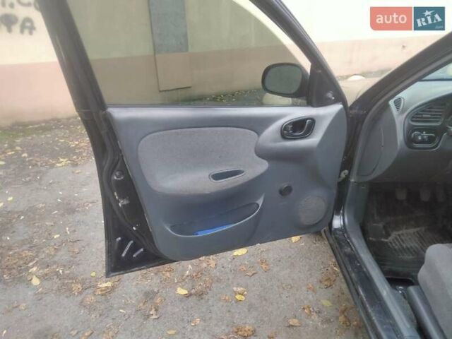 Черный Дэу Ланос, объемом двигателя 1.5 л и пробегом 200 тыс. км за 1550 $, фото 9 на Automoto.ua