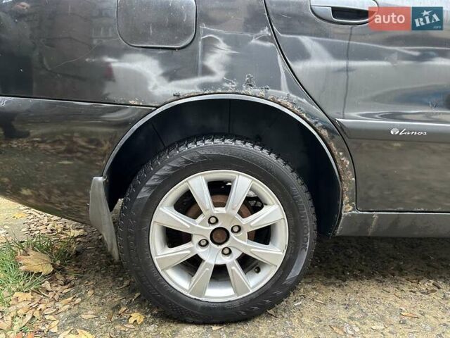 Чорний Деу Ланос, об'ємом двигуна 1.5 л та пробігом 222 тис. км за 1800 $, фото 7 на Automoto.ua