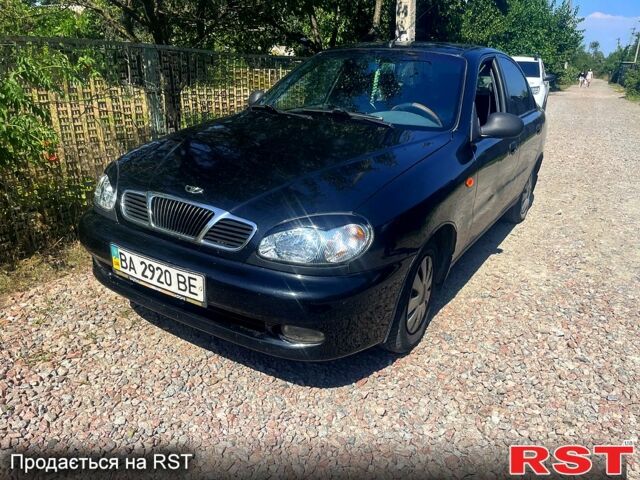 Черный Дэу Ланос, объемом двигателя 1.5 л и пробегом 200 тыс. км за 2000 $, фото 1 на Automoto.ua