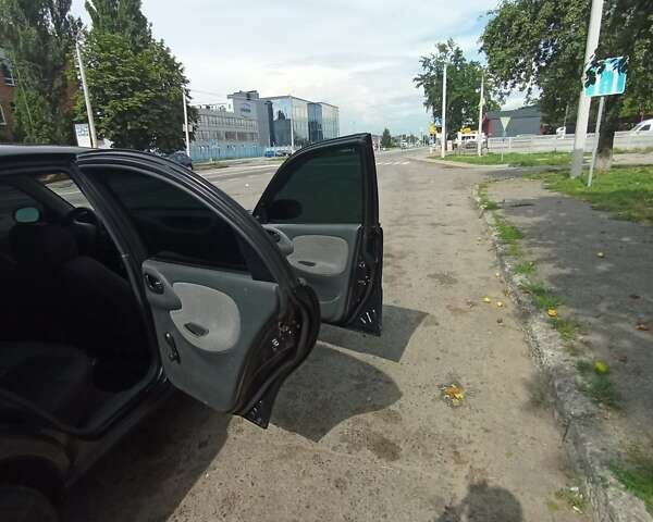 Черный Дэу Ланос, объемом двигателя 1.5 л и пробегом 202 тыс. км за 3250 $, фото 8 на Automoto.ua